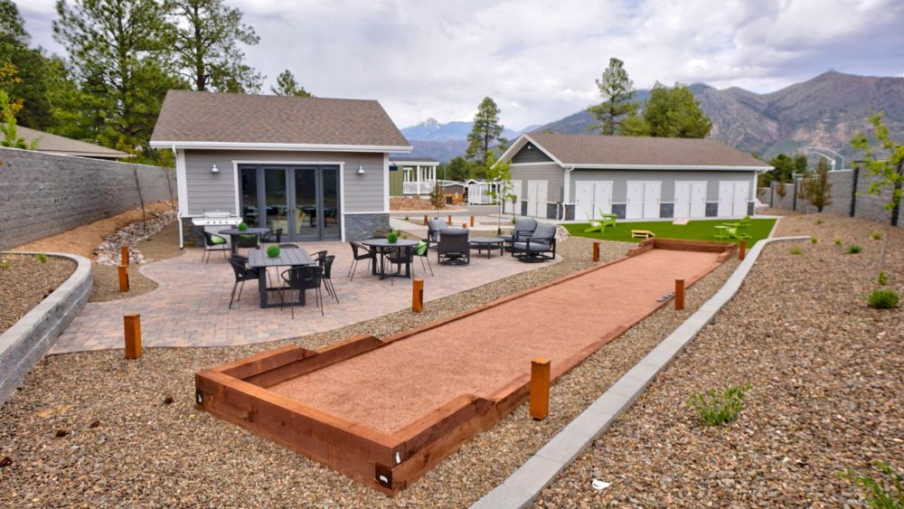 The community center yard at the tiny house village with a beautiful view